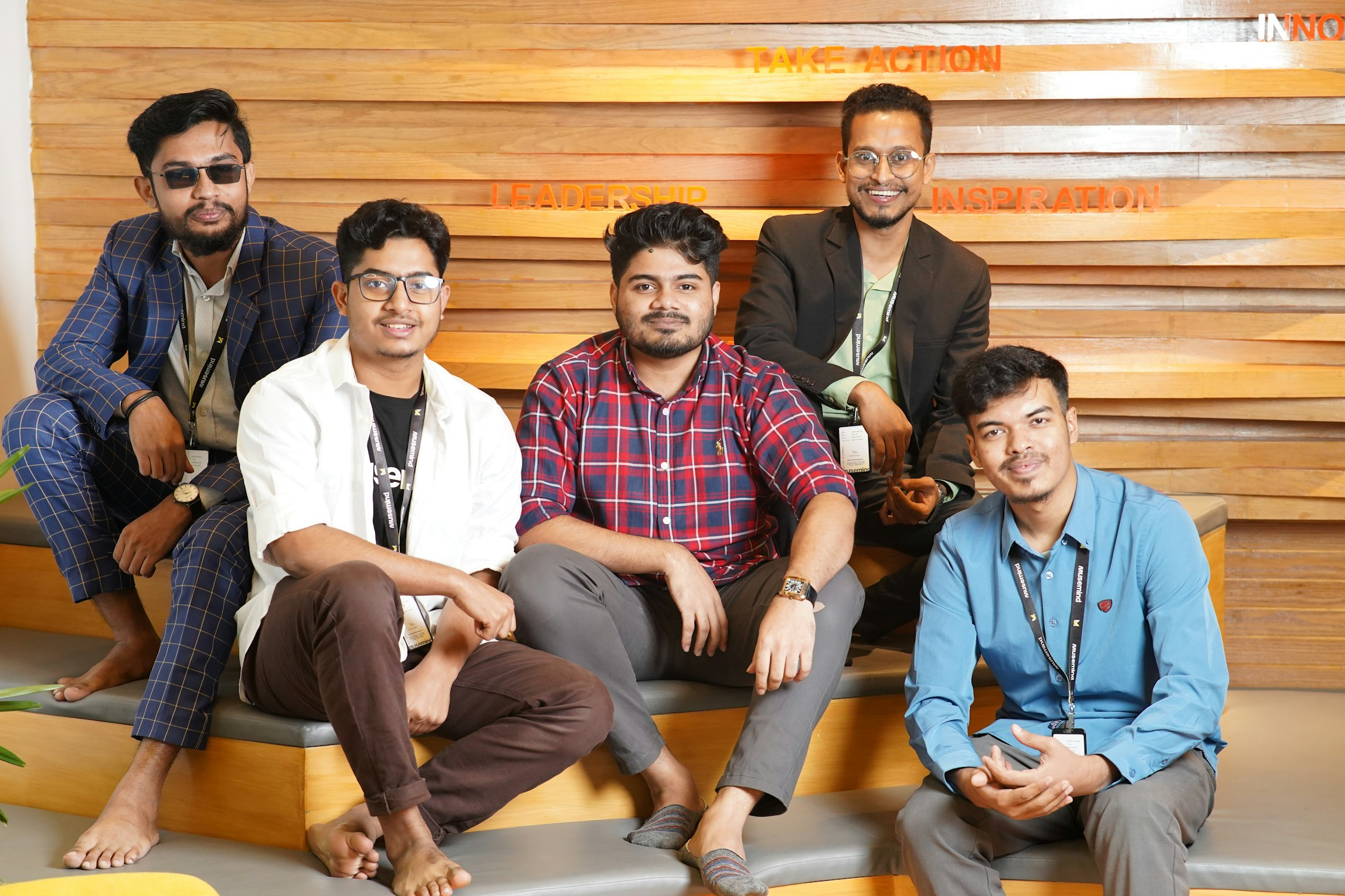 Team members on wooden steps